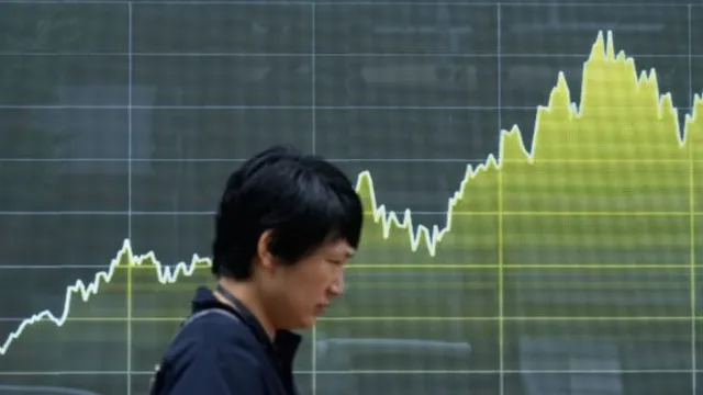 Japan's economy defies expectations with faster than forecast growth