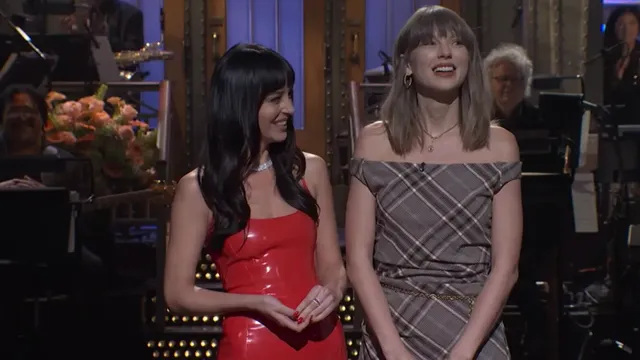Taylor Swift surprises on Saturday Night Live during Dakota Johnson's monologue