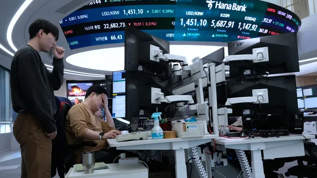 Asian markets react as U.S. futures gain despite economic worries