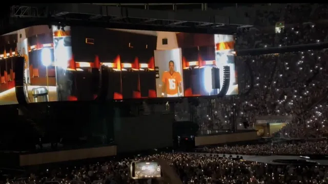Peyton Manning escorts Morgan Wallen at Neyland Stadium concert