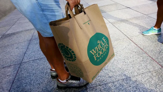 Whole Foods Settles Lawsuit Over Firing Linked to Black Lives Matter Mask