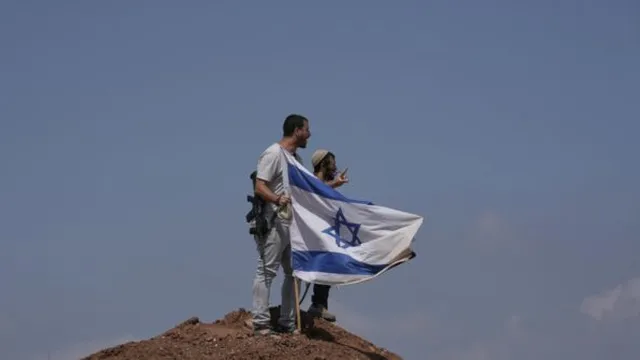 Israel hands West Bank policing to civilian forces, cementing annexation