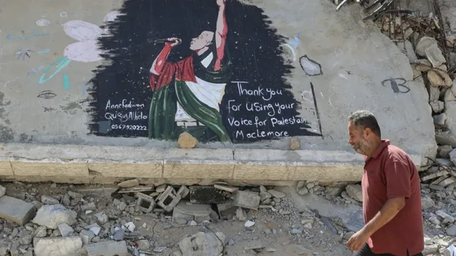 Gaza artists paint mural of rapper Macklemore after he was dropped from Ed Sheeran tour