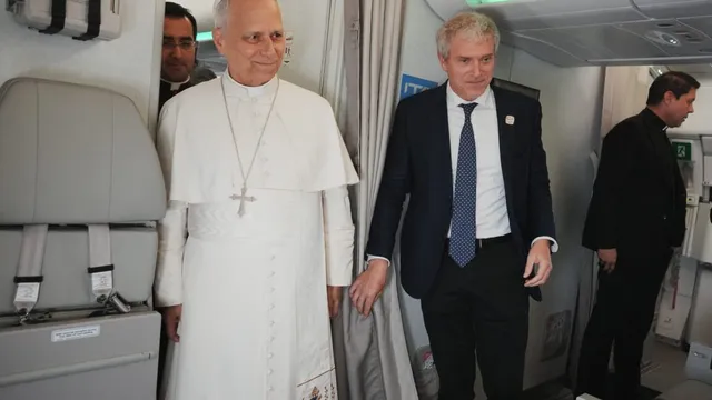 Pope Leo condemns war while carrying a photo of a slain Muslim boy