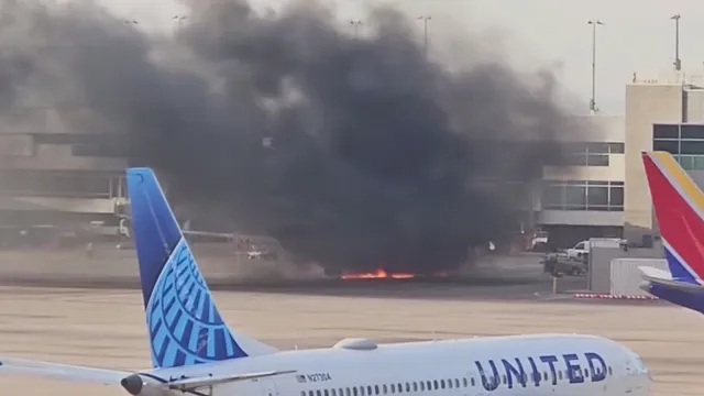 American Airlines flight 1006 catches fire at Denver airport