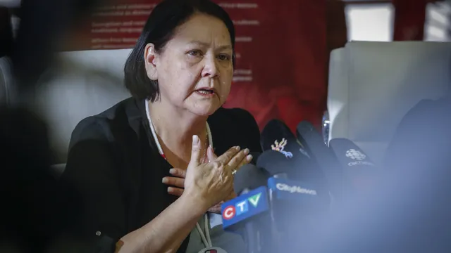 Cathy Merrick collapses outside court in Manitoba