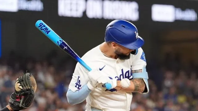 Andy Pages suffers fractured hand after hit by pitch