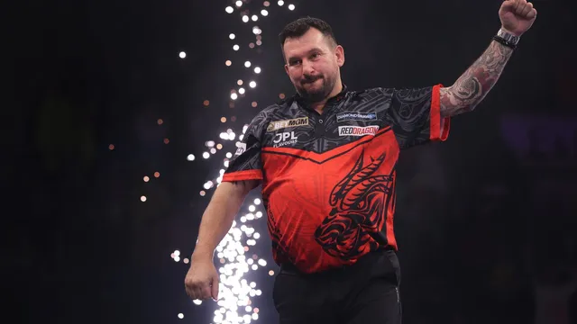 Jonny Clayton triumphs at Premier League night six while battling gout