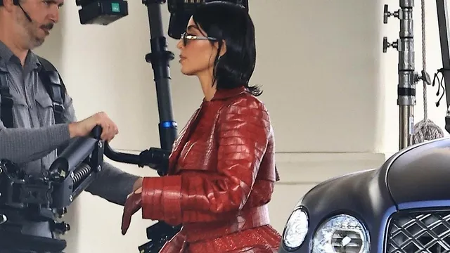 Kim Kardashian shines as a leggy divorce lawyer on All's Fair set