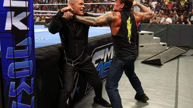 WWE SummerSlam 2026 features CM Punk defending his title against Cody Rhodes