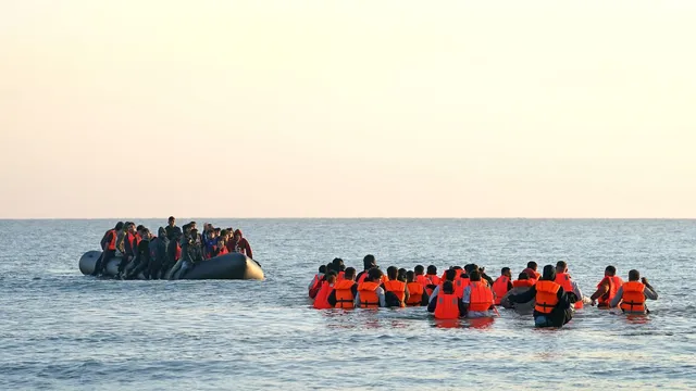 Record number of migrants surge across the English Channel in 2024