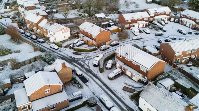 UK faces severe weather as snow and ice warnings disrupt roads and schools
