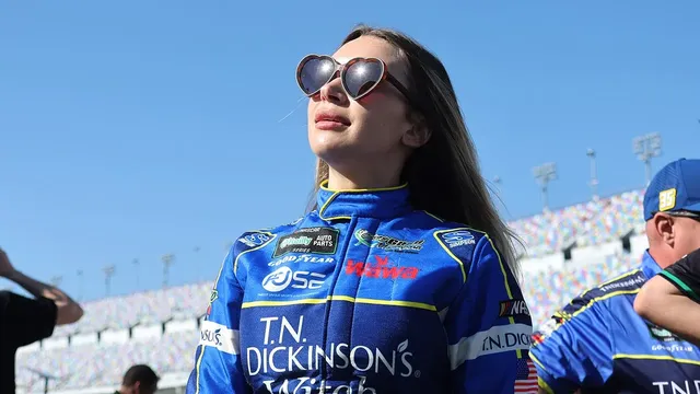 Natalie Decker reveals lingerie under her firesuit to promote jewelry line