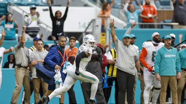 Miami Dolphins hold on for victory against Saints after interception