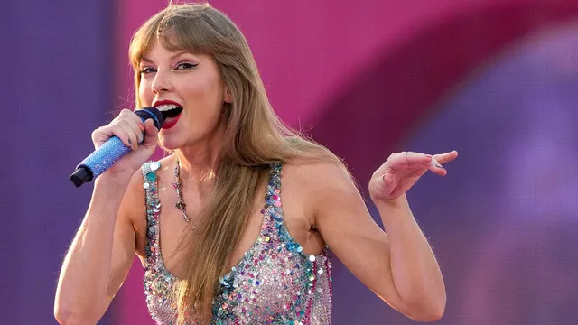 Taylor Swift surprises fans with performance at Travis Kelce's concert
