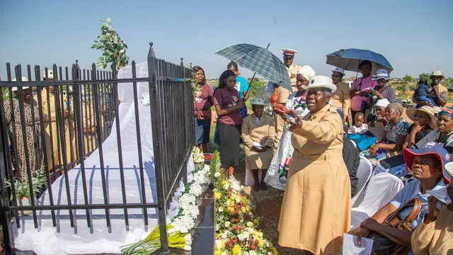 Zimbabweans celebrate by unveiling tombstones for late relatives during the holidays