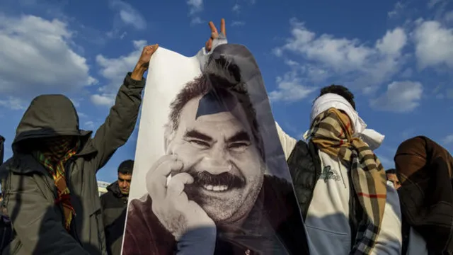 Kurdish fighters begin disarming in historic peace process