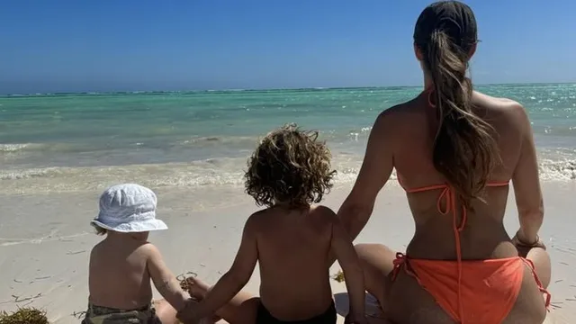 Lauryn Goodman Shares Throwback Bikini Photo with Kids