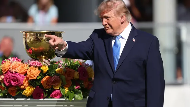 President Donald Trump attends Presidents Cup golf tournament in Illinois as honorary chairman