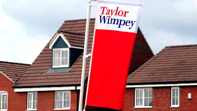 Taylor Wimpey warns of another earnings drop in tough market