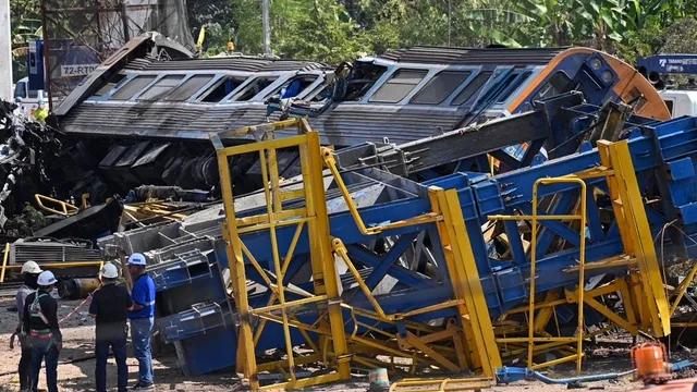 At least 31 killed after crane collapses onto train in Thailand