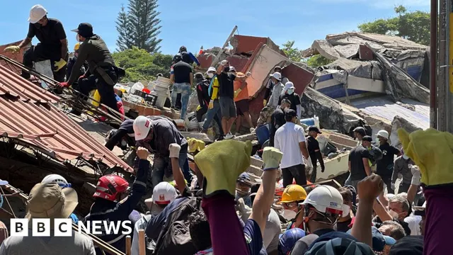 Colombian family searches for survivors under collapsed building in Cali