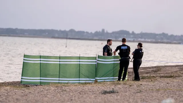 Family feared drowned after tide traps them at beach