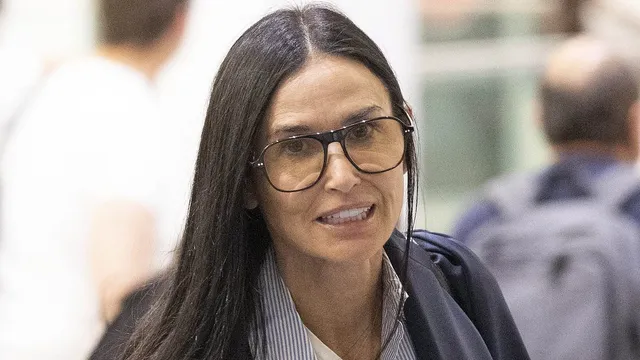 Demi Moore arrives in Toronto for TIFF with her dog Pilaf