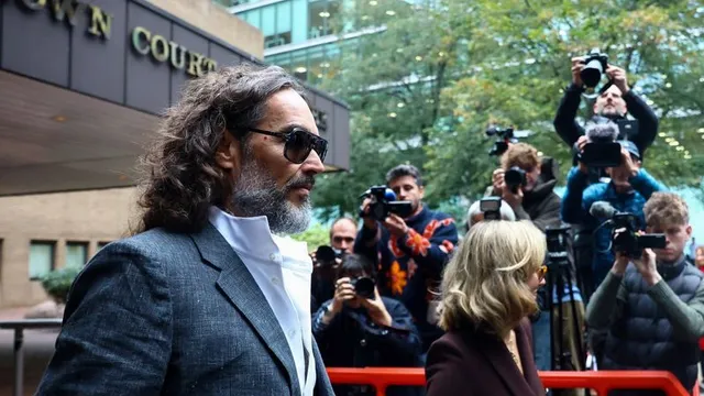 British comedian Russell Brand pleads not guilty to rape and sexual assault charges in London court