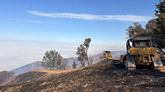 Thunderstorms threaten firefighting efforts as Timber Fire rages in California