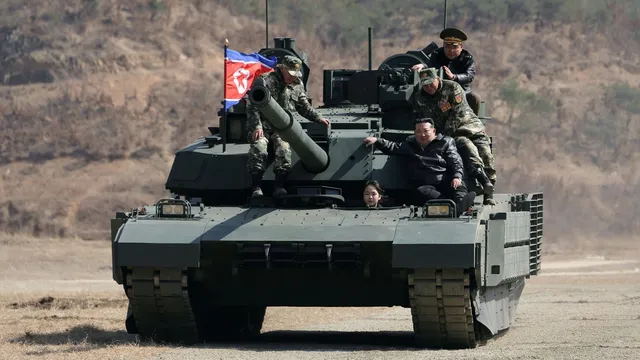 Kim Ju Ae showcases military skills driving a battle tank