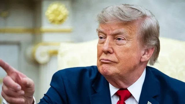President Donald Trump says he would consider pardoning his administration officials before leaving office