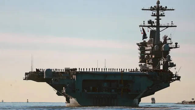 US commander visits carrier in Arabian Sea as Mideast tensions persist