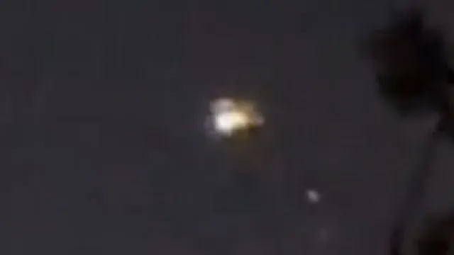 UFO drops glowing orbs over Arizona night sky before vanishing