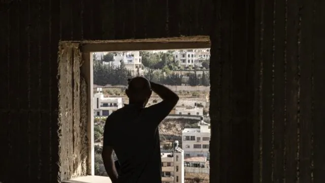 Israel orders West Bank closure after soldiers kill two Palestinians in alleged attack