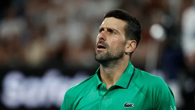 Novak Djokovic narrowly avoids disqualification after hitting ball in anger