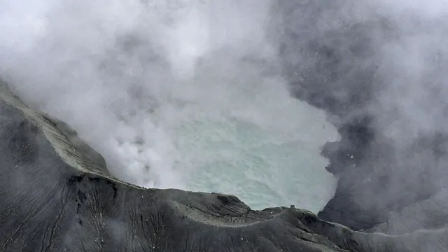 Three bodies discovered in Japan after helicopter crash in volcanic crater