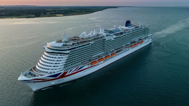 Cruise ship delayed after containers fall off cargo ship