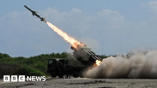 Japan's defense minister denies militarism amid rising tensions with China