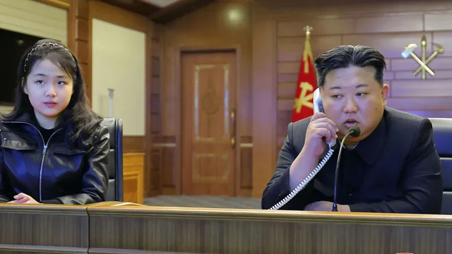 Kim Jong Un showcases missile tests with daughter amid military tensions