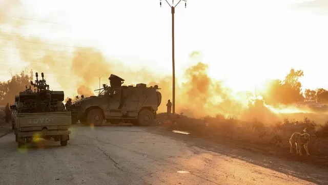 Syrian forces advance into Raqqa, gaining territory from Kurdish fighters