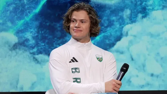 Alberto Tomba and Deborah Compagnoni light Olympic cauldron in Milan
