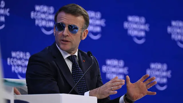 Trump ridicules Macron's indoor sunglasses during Davos speech