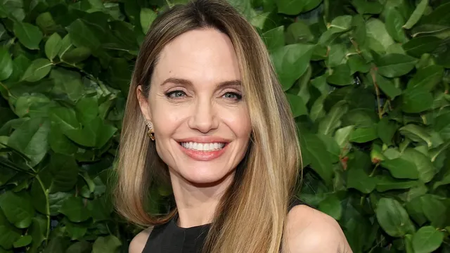 Angelina Jolie shows off new bird tattoo amid divorce drama