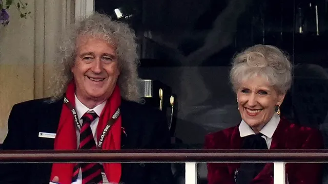 Brian May enjoys cricket at the Oval after stroke news