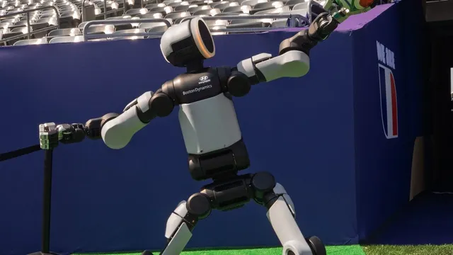 Humanoid robot Atlas delivers World Cup match ball in historic event