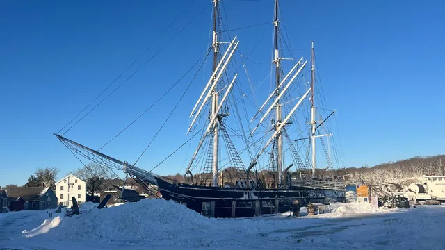 Workers fight through snow to protect historic ships at Mystic Seaport