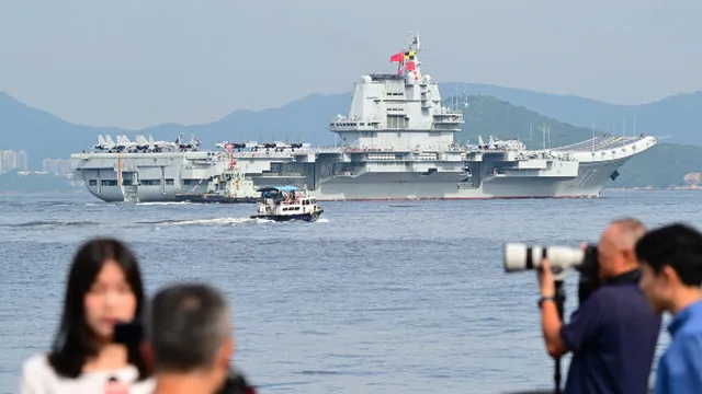 Chinese aircraft carrier Shandong docks in Hong Kong to promote patriotism