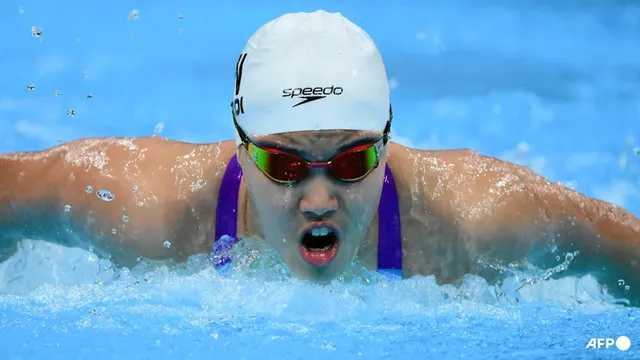 China's 13-year-old swimmer Yu Zidi tops heats at Asian Games in Tokyo