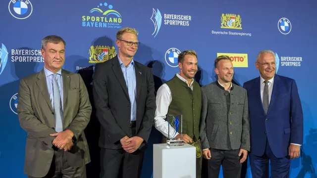 Bavarian Minister-President Markus Söder honors Bayern Munich coach Vincent Kompany with sports prize